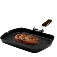 Bistecchiera Zanetti 24×36 cm in alluminio pressofuso effetto pietra, con manico pieghevole e fondo a induzione, per grigliare carne e verdure.