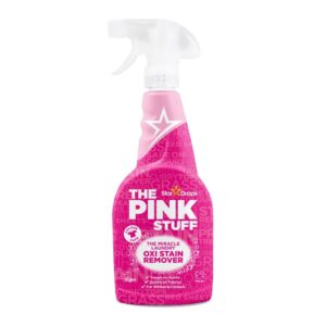 Confezione di The Pink Stuff Oxi Stain Remover (polvere/spray) per il trattamento delle macchie.
